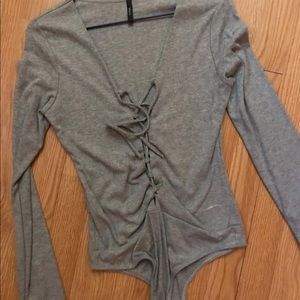 Grey thong body suit